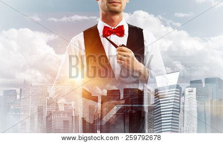 Double Exposure Of Confident And Young Businessman In Smart-casual Wear Smoking Pipe And Modern City