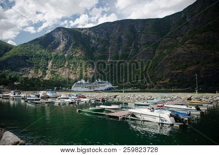 Aurlandsfjord, Flam, Norway - 27 July, 2018: Boats Moored In Harbour And Beautiful Mountains At Aurl