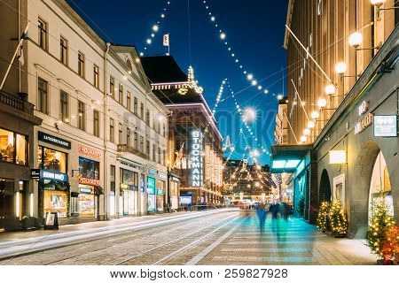 Helsinki, Finland - December 6, 2016: Night View Of Aleksanterinkatu Street With Railroad In Kluuvi 