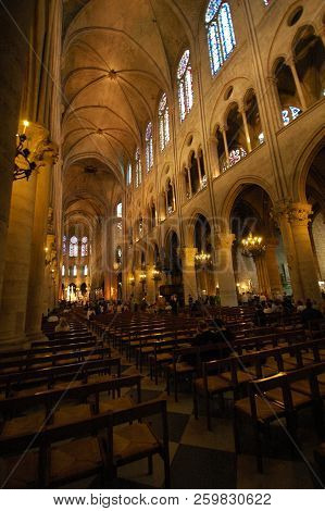 Paris, France-jul 23, 2018: The Central Nave Colonnade Of Notre Dame Gothic Cathedral. Our Lady Of P