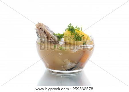 Vegetable Soup With Fish In A Glass Bowl