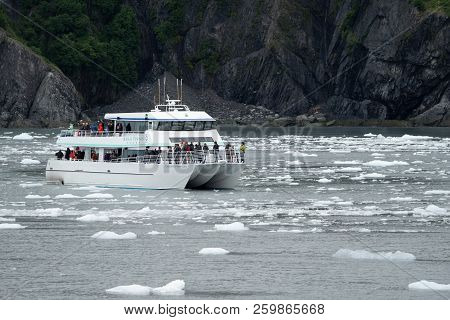 August 4 2018 - Seward Ak: Tourist Boat In Kenai Fjords National Park Breaks Through The Icebergs In