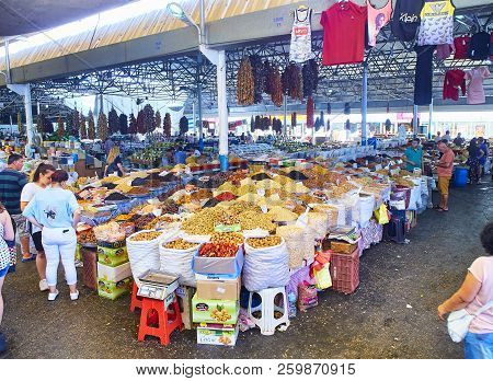Bodrum, Turkey - July 6, 2018. Citizens shopping in Bodrum market, Kapali Pazar Yeri, at downtown. Mugla Province, Turkey.