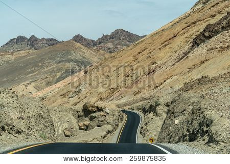 Road Through Artists Drive To Artists Palette In Death Valley National Park Features Colorful Rock F