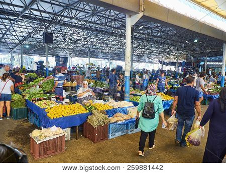 Bodrum, Turkey - July 6, 2018. Citizens shopping in Bodrum market, Kapali Pazar Yeri, at downtown. Mugla Province, Turkey.
