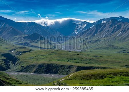 View Of The Alaska Range Mountains From Eielson Visitors Center In Denali National Park As Storm Clo