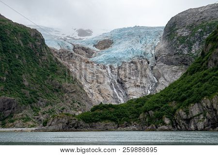 Aialik Glacier In Kenai Fjords National Park Alaska. Face Of The Glacier Is Several Hundred Feet Hig