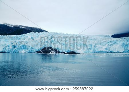 Aialik Glacier In Kenai Fjords National Park, Alaska; The Face Of The Glacier Is Several Hundred Fee