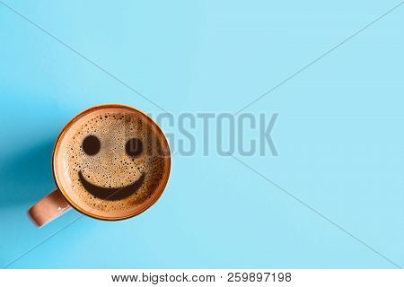 Cup Of Delicious Hot Coffee With Foam And Smile On Color Background, Top View. Happy Morning, Good M