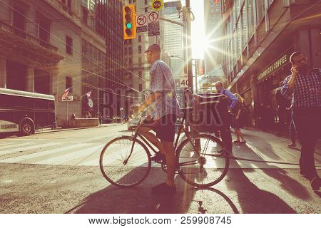 Toronto, Canada - September 17, 2018: Rush Hour At Toronto Downtown, Many People On The Street. Suns