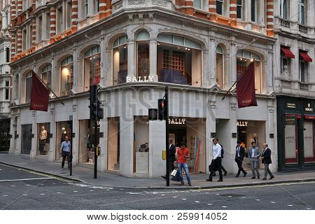 London, Uk - July 6, 2016: People Walk By Bally Fashion Store At New Bond Street In London. Bond Str