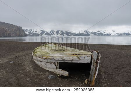 Old Wooden Boat On The Beach On Deception Island, Antarctica