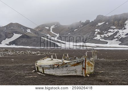 Old Wooden Boat On The Beach On Deception Island, Antarctica
