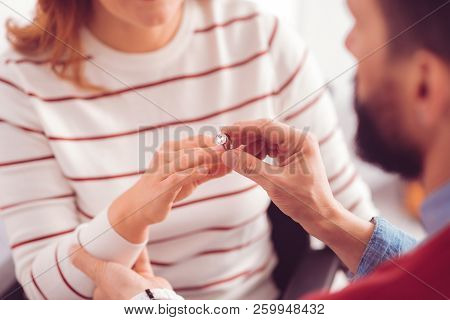 Close Up Of Engagement Ring On The Finger