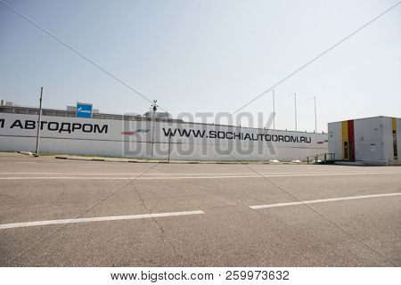 Adler, Sochi, Russia - September 6, 2018: Part of Sochi Autodrom with Back of Tribunes. Track f1 wich Located in Olympic Park in Adler. Cyrillic Text on The Wall: 