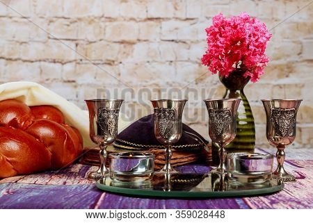 Traditional Jewish Sabbath Shalom Ritual Fresh Challah Bread With Kiddush Four Cup Of Red Kosher Win
