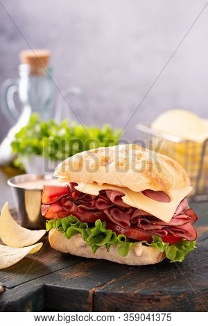 Healthy And Filling Roastbeef Sandwich With Swiss Cheese And Thousand Island Sauce