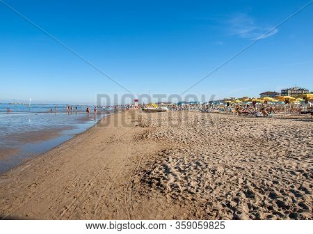 Cesenatico, Emilia Romagna, Italy - Sept 13 2019: People Are Resting On A Sunny Day At The Beach In 