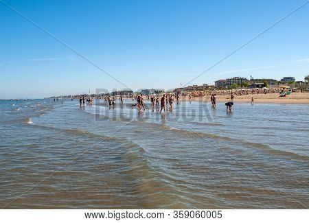 Cesenatico, Emilia Romagna, Italy - Sept 13 2019: People Are Resting On A Sunny Day At The Beach In 