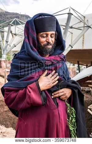 Lalibela, Ethiopia - Feb 13, 2020: Ethiopian People At The The Church Of Bete Amanuel, Monolitic Chu