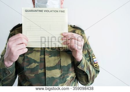 Police Officer With Handcuffs In Khaki Colored Uniform Stops People On The Street For Violating Rule