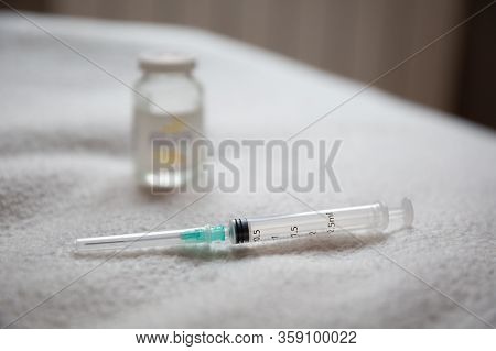 Vaccine And Syringe Injection. Prevention,immunization And Treatment From Corona Virus Infection Cov