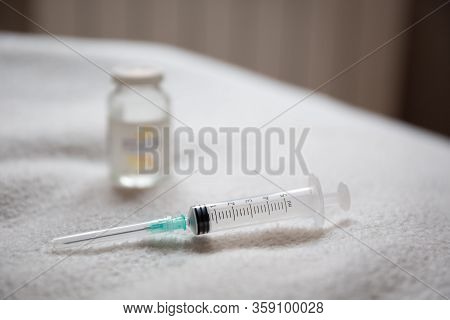 Vaccine And Syringe Injection. Prevention,immunization And Treatment From Corona Virus Infection Cov