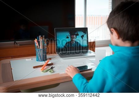 Kid Studying At Home His Online Lesson