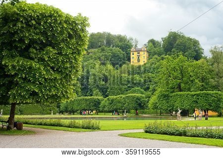 Salzburg, Austria - May 28, 2019: The Hellbrunn Museum Is Perched High Above The Estate With Its Man