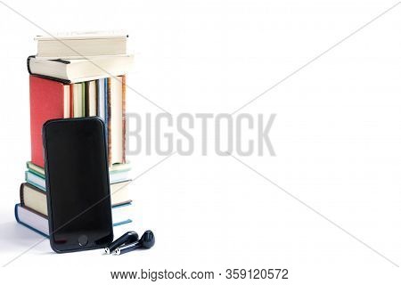 Stack Of Colored Books, Headphones And Mobile Phone, Mobile Library In Smartphone Concept, Audiobook
