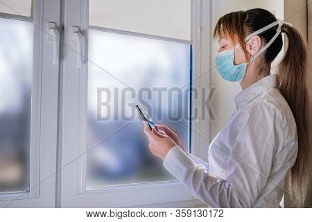 A Woman Call Friends By Phone, Stay And Safer At Home For Self Quarantine To Stop The Coronavirus, P