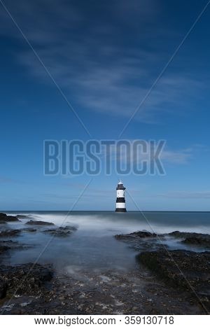 Penmon Lighthouse In Anglesey On A Sunny Day