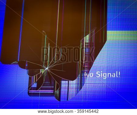 A Closeup Of A Cracked Monitor Screen With The Words 