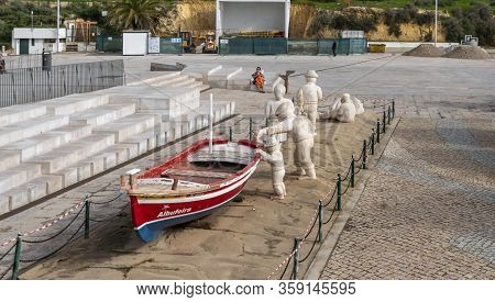 Albufeira, Algarve, Portugal, February 2020 - Stone Statues Of Fishermen In Albufeira, Algarve, Port