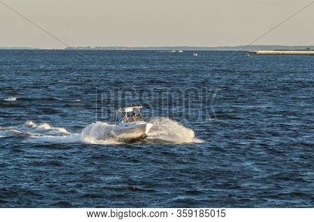 New Bedford, Massachusetts, Usa - September 5, 2018:  Powerboat Banging Across Choppy Waters In New 