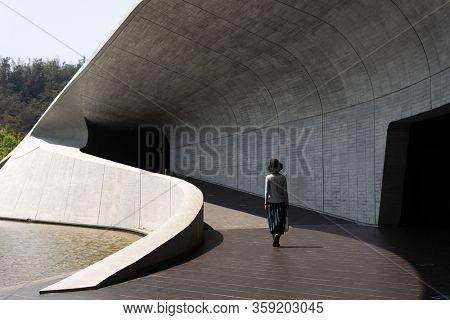 traveling woman walk at Xiangshan Visitor Center, Sun Moon Lake, Nantou, Taiwan