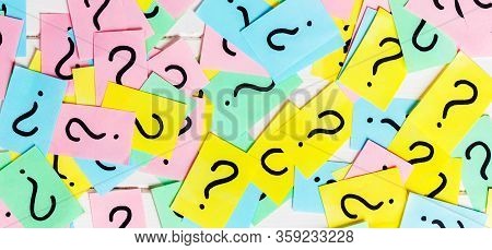 Colorful Paper Notes With Question Marks. Closeup