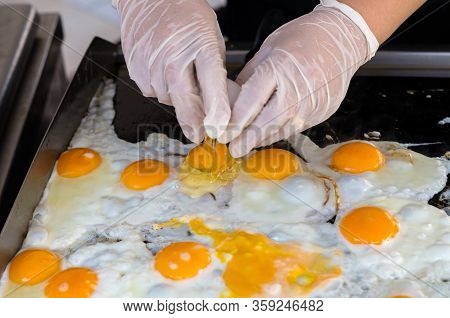 Eggs For Cooking, Top View, Natural Quick Breakfast Of Fresh Eggs. Female Hands Break Eggs For A Qui