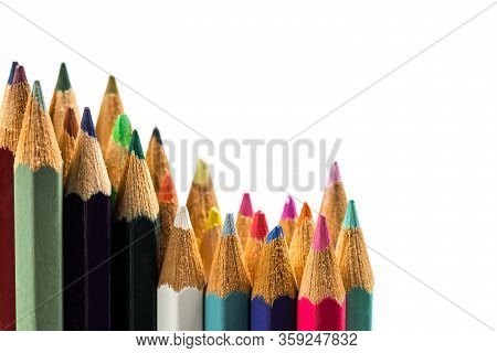Colored Wooden Sharpened Pencils For Office And School On A White Background