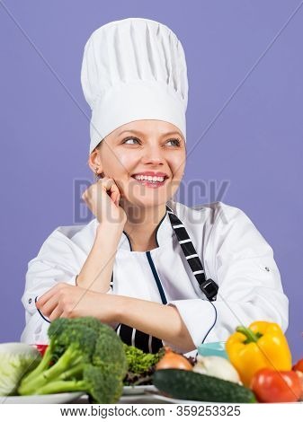 Eat Your Greens. Professional Chef With Many Healthy Products. Happy Chef Preparing Meal With Variou