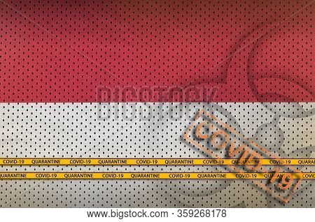 Indonesia Flag And Orange Covid-19 Stamp With Border Tape. Coronavirus Or 2019-ncov Virus Concept