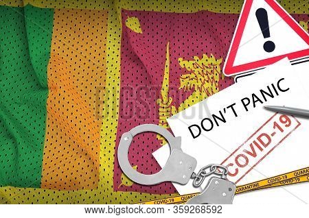 Sri Lanka Flag And Police Handcuffs With Inscription Dont Panic On White Paper. Coronavirus Or 2019-