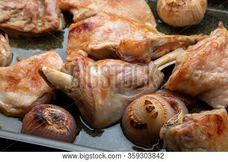 Roast Meat Of Suckling Lamb (suckling Lamb). Fresh From The Oven And Smoking. Prepared On A Roasting