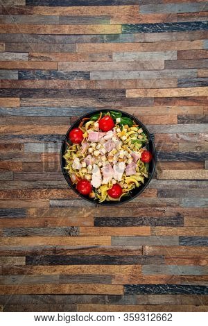 cereal specialties cooked with salad, roasted chicken aiguillette cured with salted and bacon