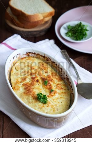 Dietary Souffle Of Minced Meat With Parsley On A Dark Background.