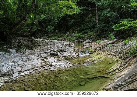Road To Waterfalls And River. Summer Forest