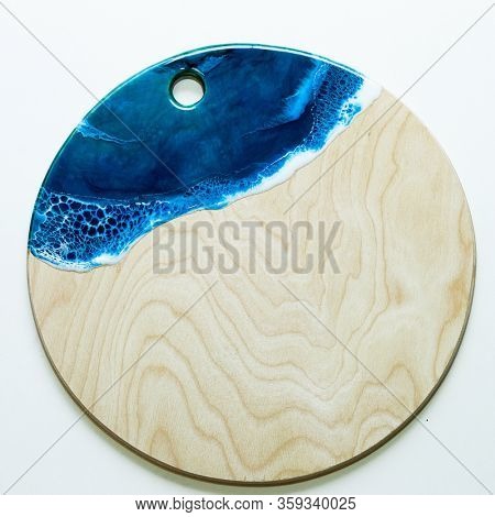 Part of original epoxy resin art close up lacing on wood