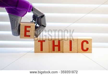 Wooden Blocks With The Word Ethic. Defending, Systematizing And Recommending Concepts Of Right And W