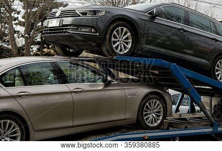 Bucharest, Romania - March 02, 2020: A Bmw 520d Car And A Volkswagen Passat B8 Highline Variant Are 