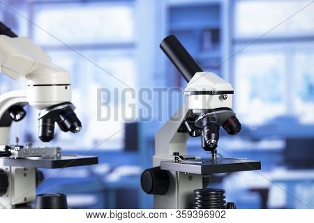 Science Concept. Modern Scientific Laboratory Interior. Reaserch Station With Microscopes On The Gla